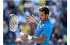 EASTBOURNE, ENGLAND - JUNE 21:  Feliciano Lopez of Spain returns against Richard Gasquet of France during their Men's Singles Finals match on day eight of the Aegon International at Devonshire Park on June 21, 2014 in Eastbourne, England. (Photo by Jan Kruger/Getty Images)